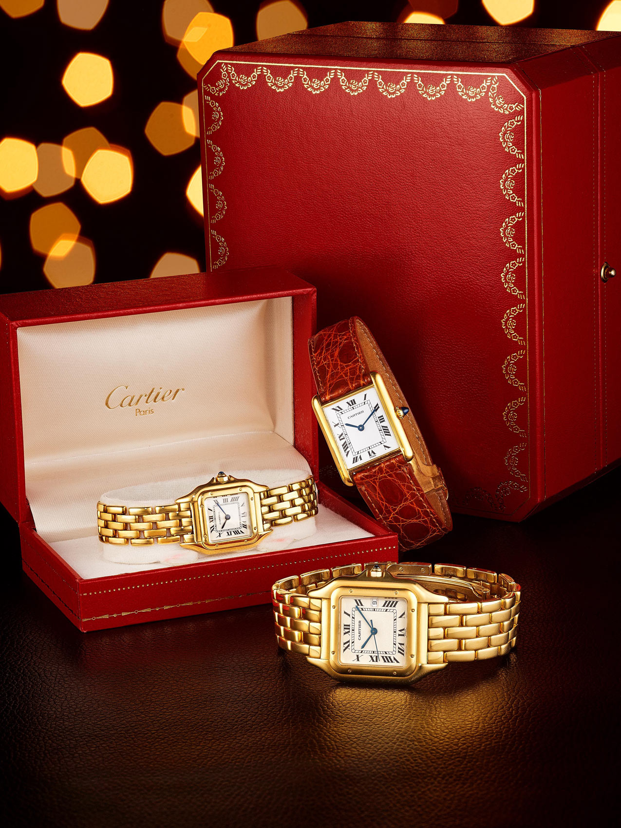 3 Gold and Leather Cartier Watches