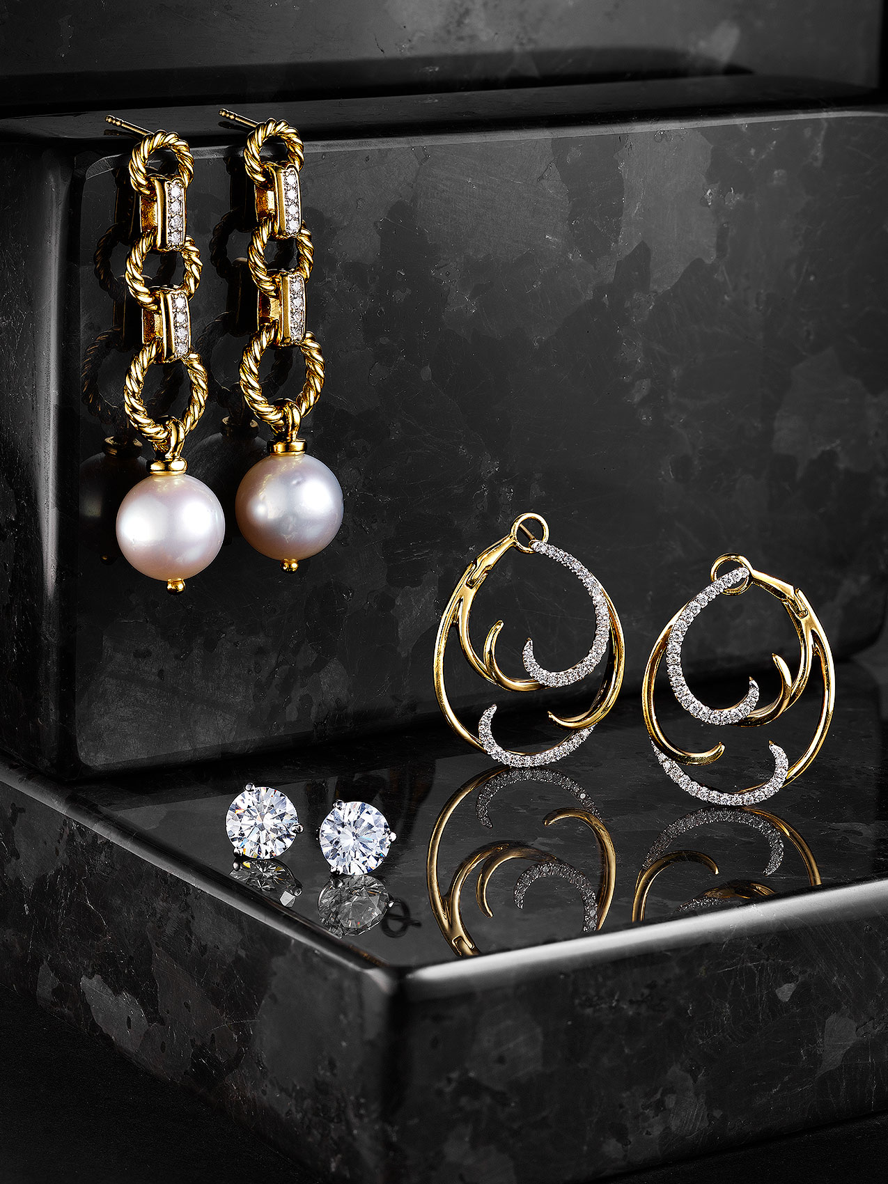 Diamond and Pearl Jewelry on Marble