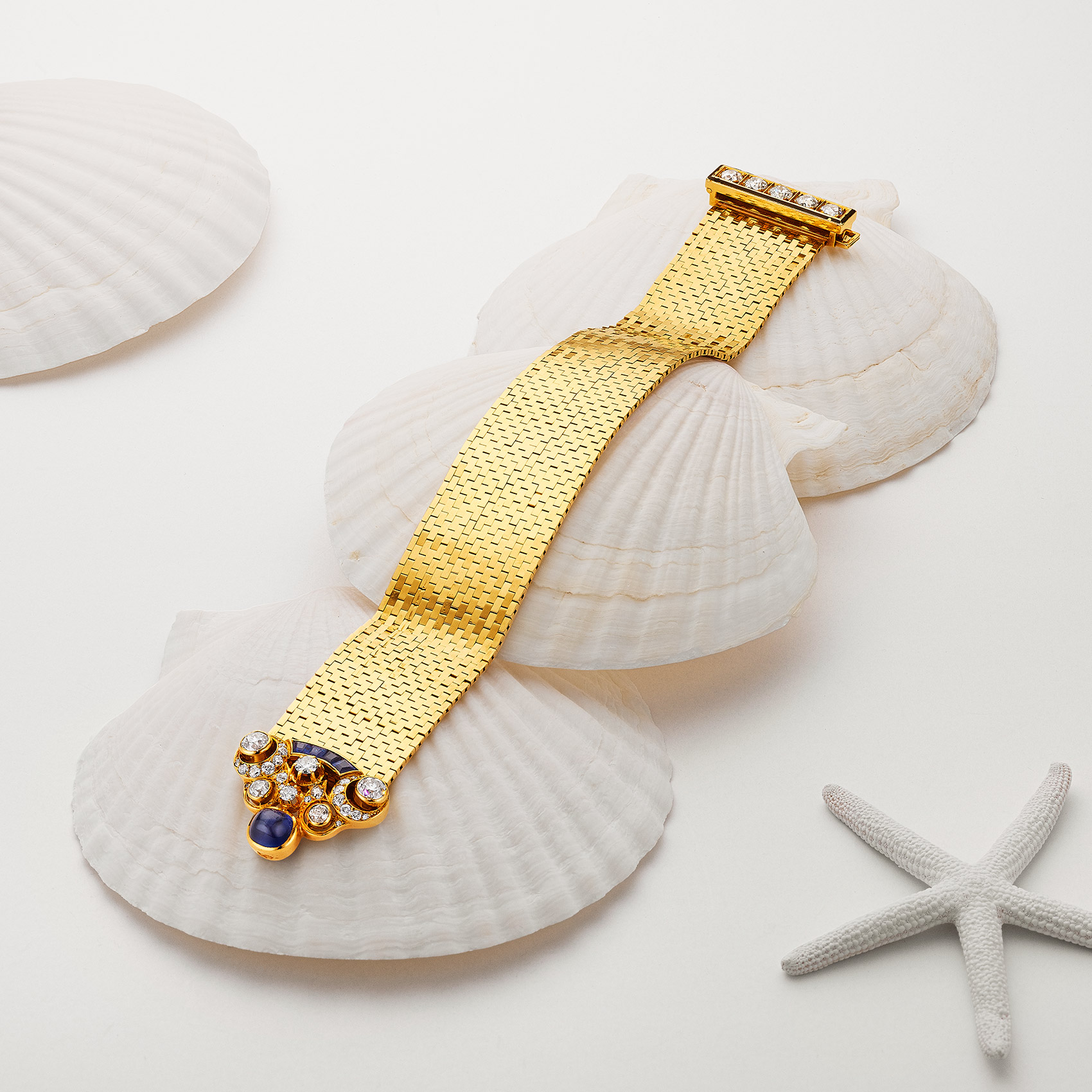 Gold, Diamond, and Sapphire Bracelet on Shells