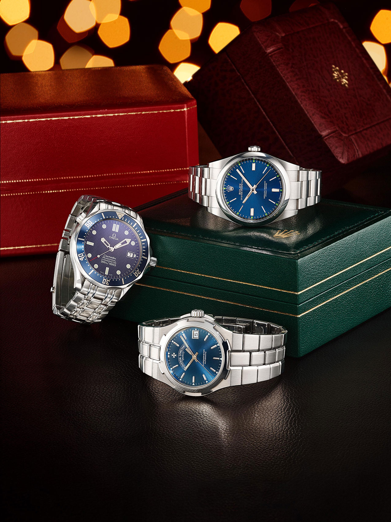 Three Silver Watches on Bokeh